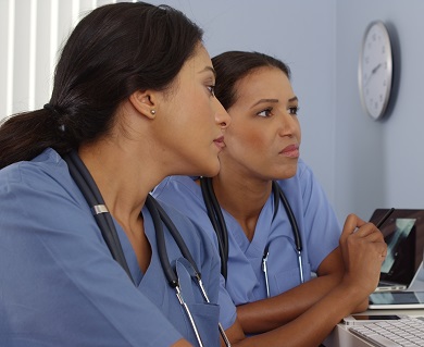 Two nurses in discussion